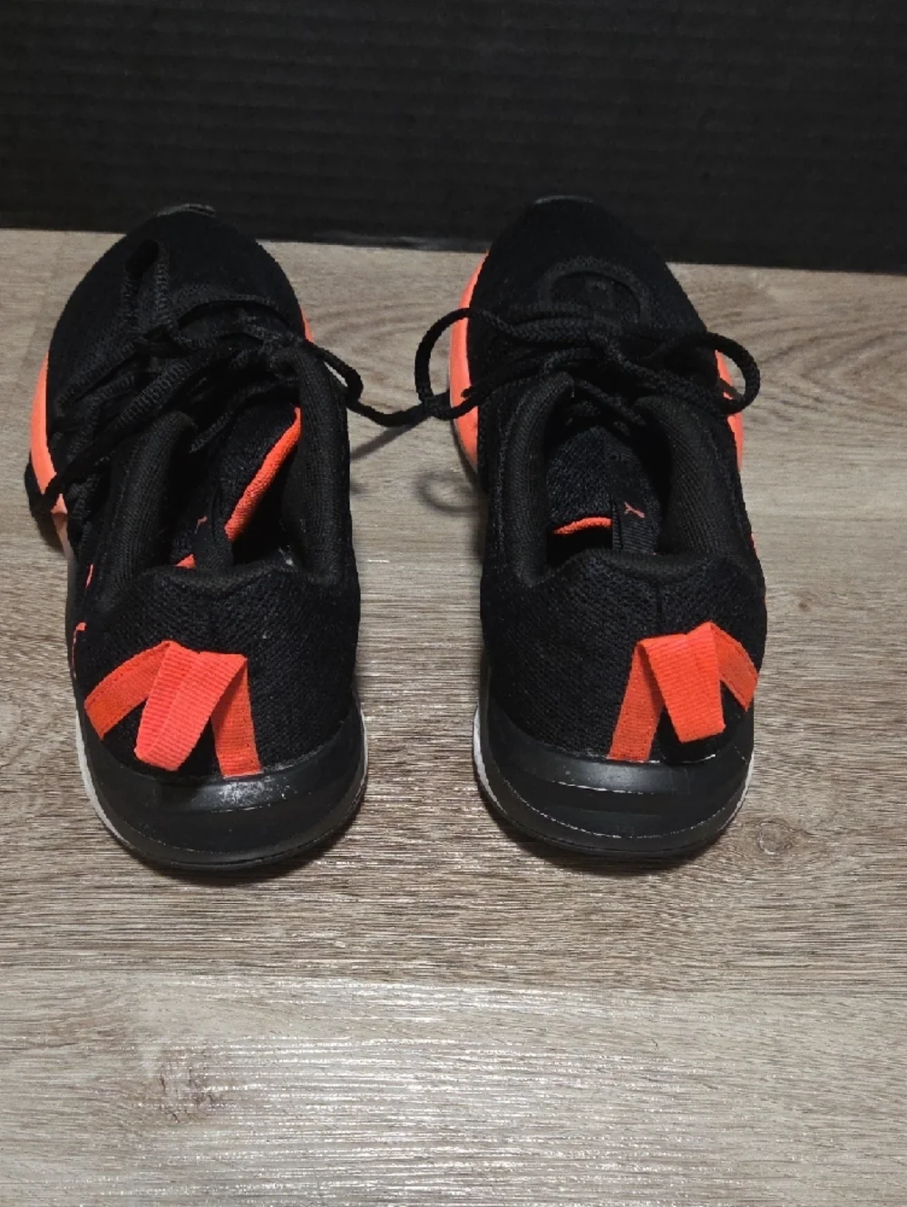 Puma Black Athletic Sneakers with Coral Accents